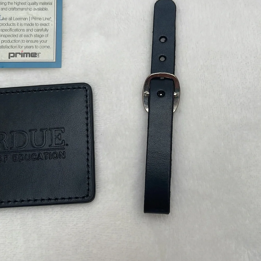 NWT Leeman Purdue Leather black bag/luggage tag